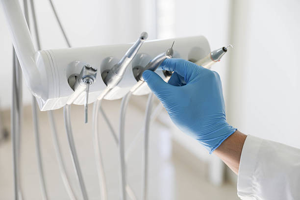 Professional Tooth Extraction technician working in Belleville, IL
